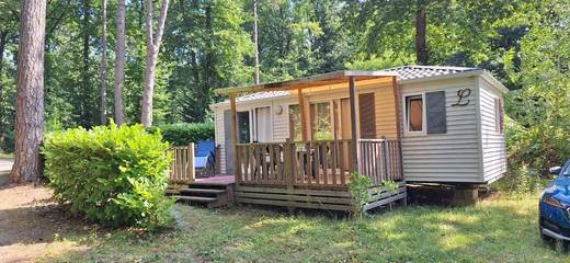 Lodge pour 4 personnes, avec piscine et jardin ainsi que bassin pour enfant et vue dans Essonne