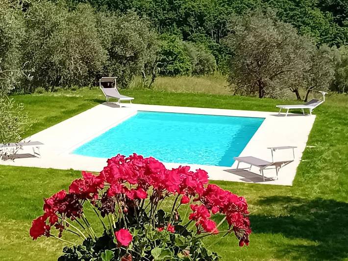 Agriturismo per 7 persone, con giardino e piscina nonché panorama in Gaiole in Chianti