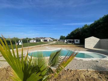 Chalet pour 2 personnes, avec jardin ainsi que vue et piscine dans le Lot-et-Garonne