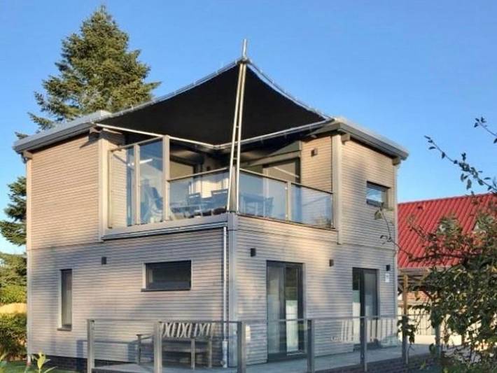 Ferienhaus für 4 Personen, mit Balkon und Terrasse sowie Garten und Sauna