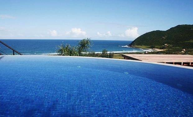 Casas e apartamentos de temporada para 2 pessoas, com piscina e jardim e ainda vista and piscina infantil em Garopaba