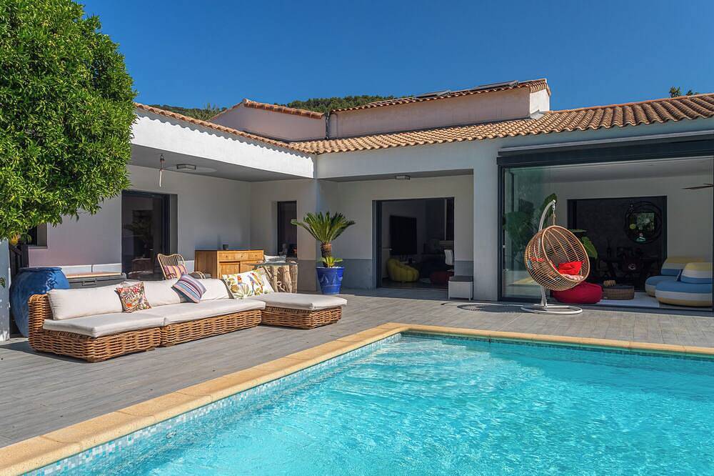 Contemporary Villa D Architect terrace pool surrounded by peaceful olive trees in Solliès-Pont, Toulon region