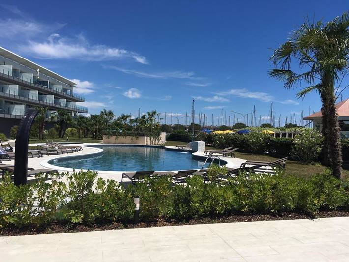 Ferienwohnung für 4 Personen, mit Whirlpool und Terrasse sowie Garten und Pool in Marano Lagunare