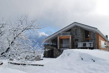 Chalet pour 15 personnes, avec terrasse et jardin ainsi que sauna et jacuzzi à Villaroger