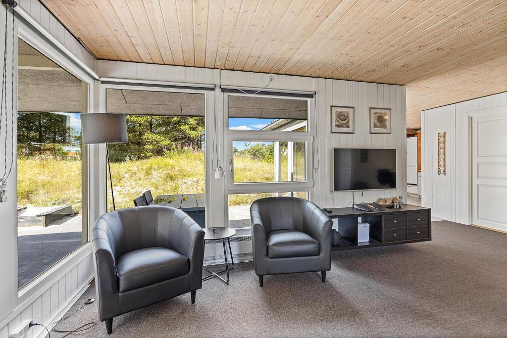 Ferienhaus mit Spa, Außensauna und Außendusche in Henne Strand in Henne, Filsø See