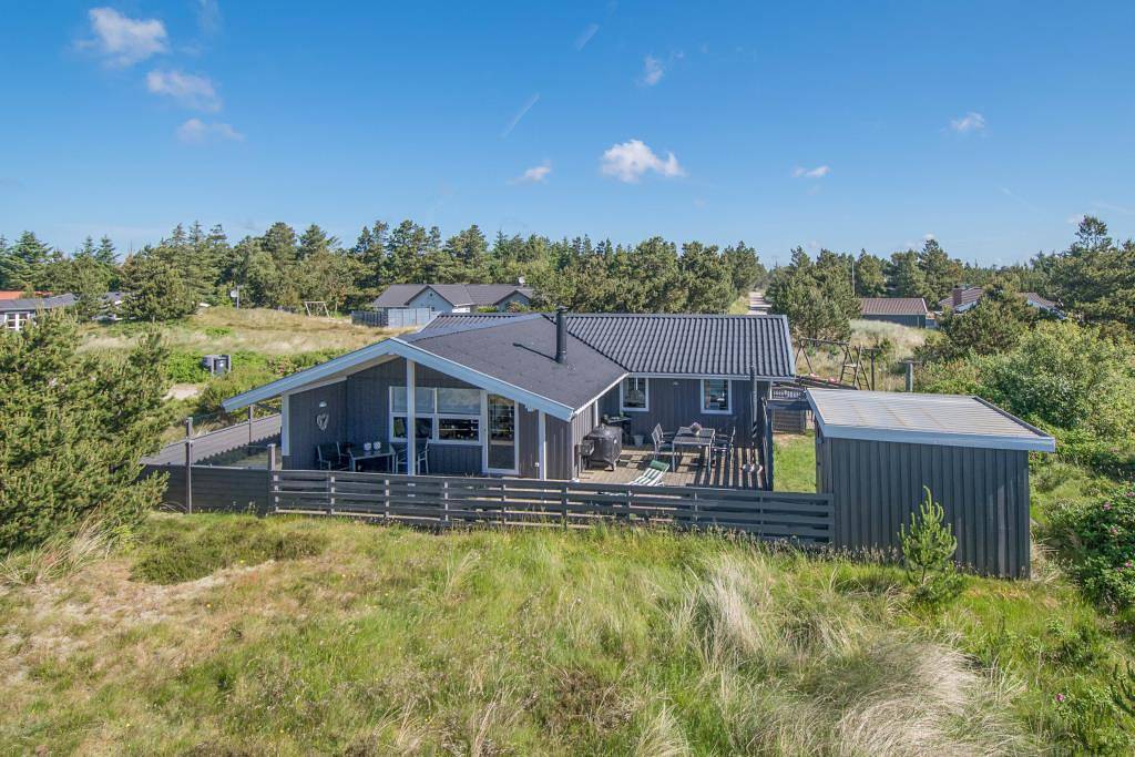 Comfortable holiday home with south-west facing terrace, sauna and fireplace in Blavand, Varde Region