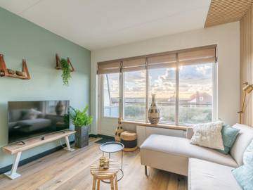 Ferienwohnung für 2 Personen, mit Balkon und Sauna, kinderfreundlich in De Koog