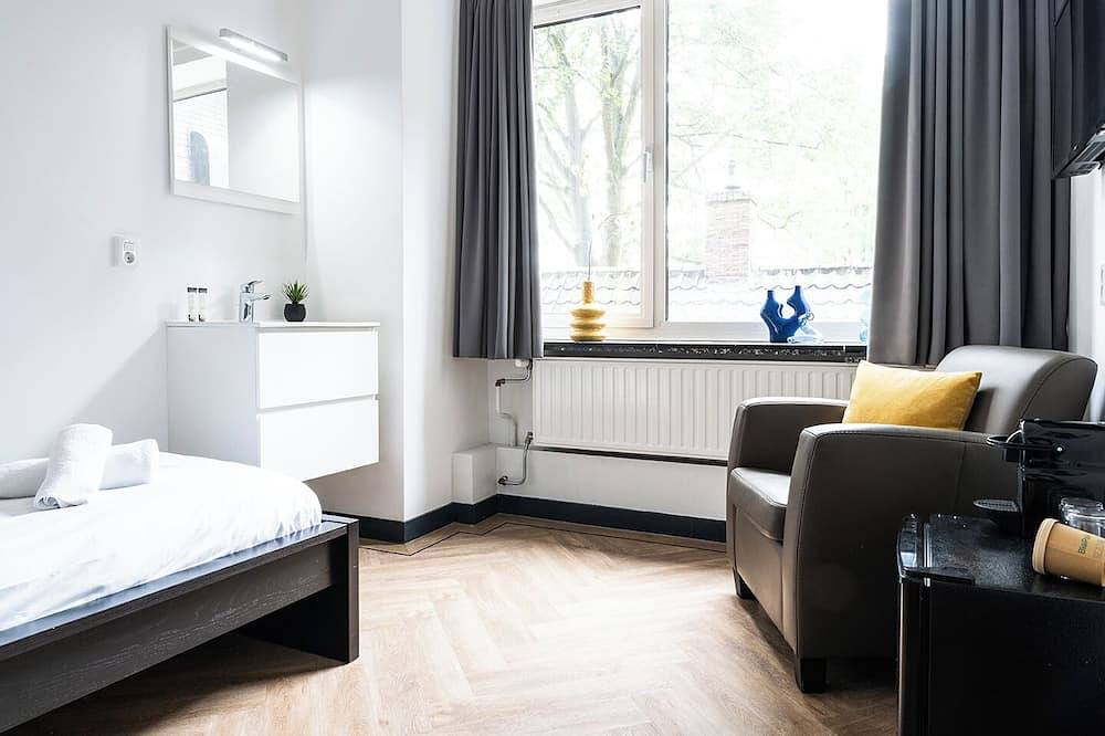 Geheel appartement, Kom tot rust in een eigentijdse, recent gerenoveerde eenpersoonskamer, ideaal gelegen in het centrum in Tilburg, Noord-Brabant
