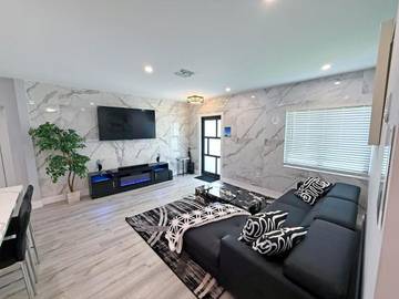 Villa pour 11 personnes, avec piscine et bassin pour enfant ainsi que jardin et vue, animaux acceptés à Miami