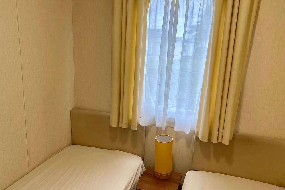 Lotus 2 bedroom dog friendly caravan with veranda offers a stunning sea view. in Poole, Poole Harbour