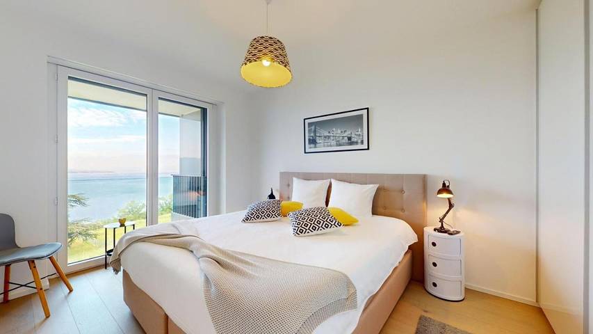 Appartement de vacances pour 2 personnes, avec Balcon et Piscine ainsi que Vue et Vue sur le lac