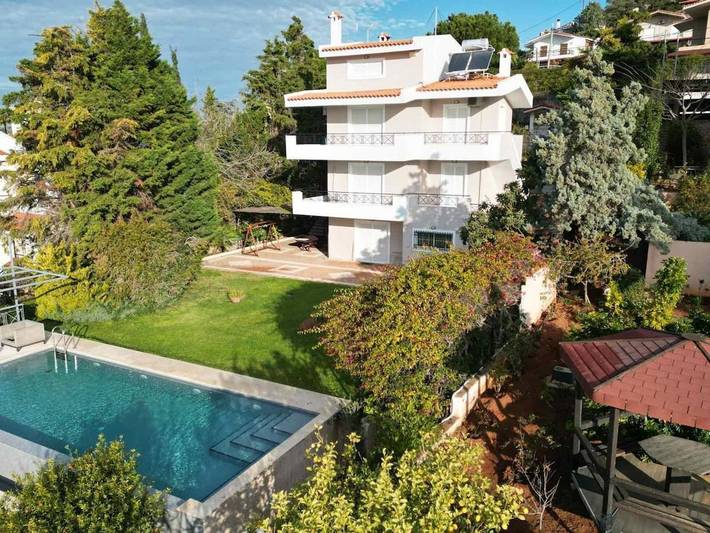 Location de vacances pour 10 personnes, avec piscine ainsi que vue et jardin dans Anavissos