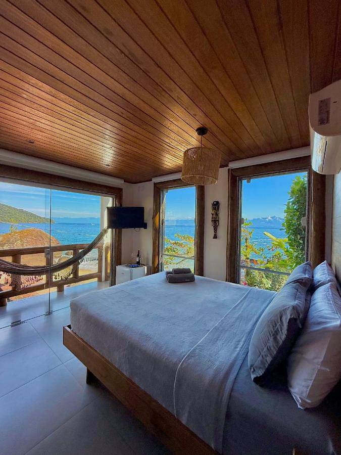 Casas e apartamentos de temporada para 4 pessoas, com vista e jardim em Ilha Grande