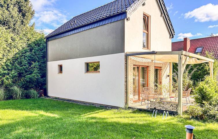 Ferienhaus für 7 Personen, mit Terrasse und Ausblick sowie Garten
