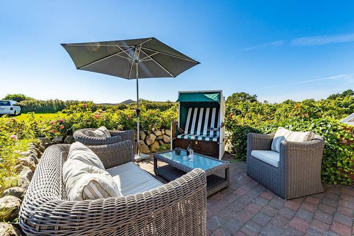 Ferienwohnung für 4 Personen, mit Terrasse und Sauna sowie Ausblick in Kampen (Sylt)