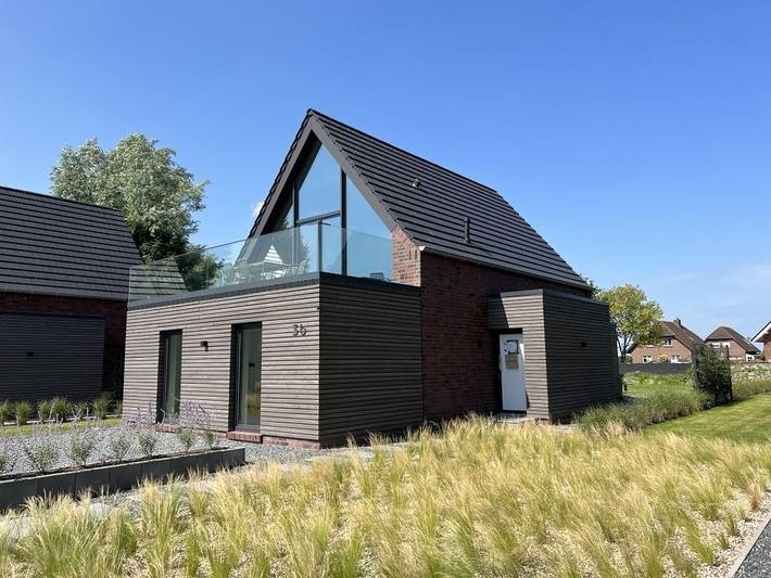Ferienhaus für 6 Personen, mit Terrasse und Ausblick sowie Garten, mit Haustier