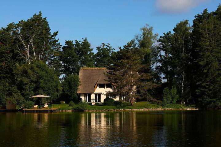 Maison de vacances pour 4 personnes, avec sauna ainsi que vue sur le lac et jardin