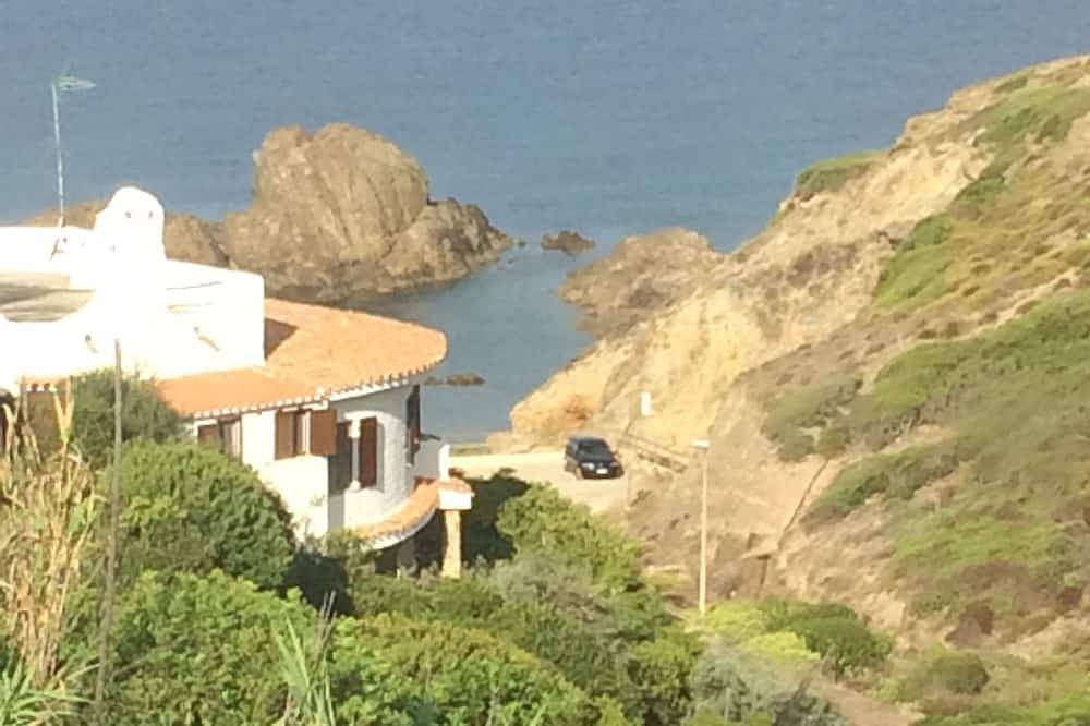 Crystal clear sea of Sardinia, sand desert, dunes and relaxation in Torre dei Corsari, Campidano di Terralba