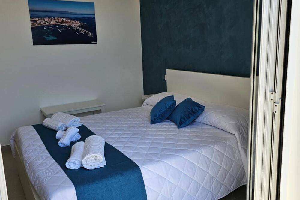 Bed and Breakfast Aura Beb - Habitación Cuádruple in Pachino, Provincia de Siracusa