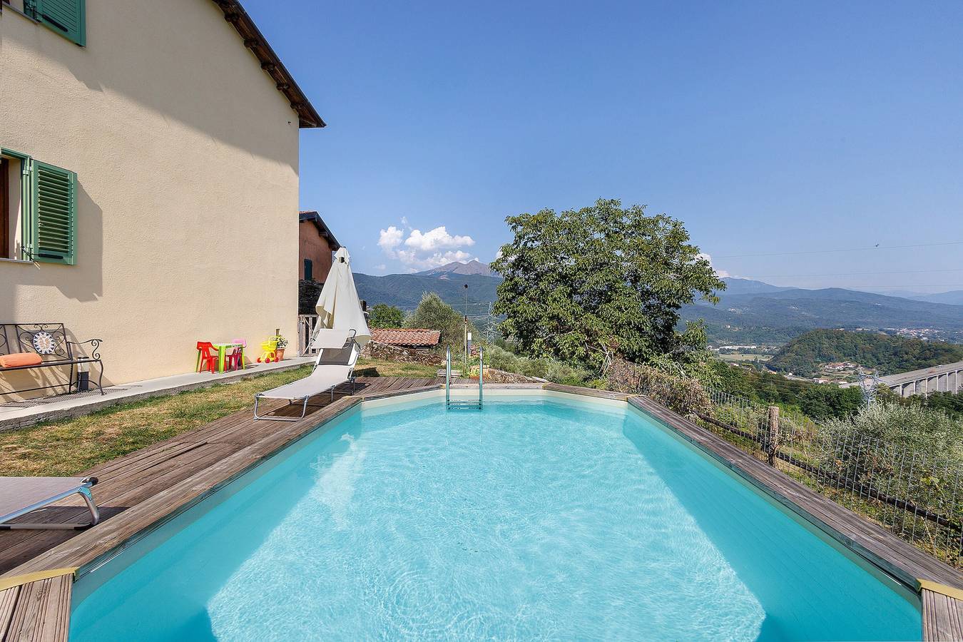 Maison de vacances « Stanza Comodità Piano Terra » avec vue montagne, piscine et jardin partagés in Pontremoli, Val di Magra