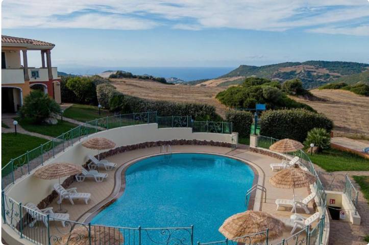 Entire apartment, Residenza Le Farfalle 'Two-Room Apartment B' with Garden View, Shared Pool in Tergu, Sassari Province