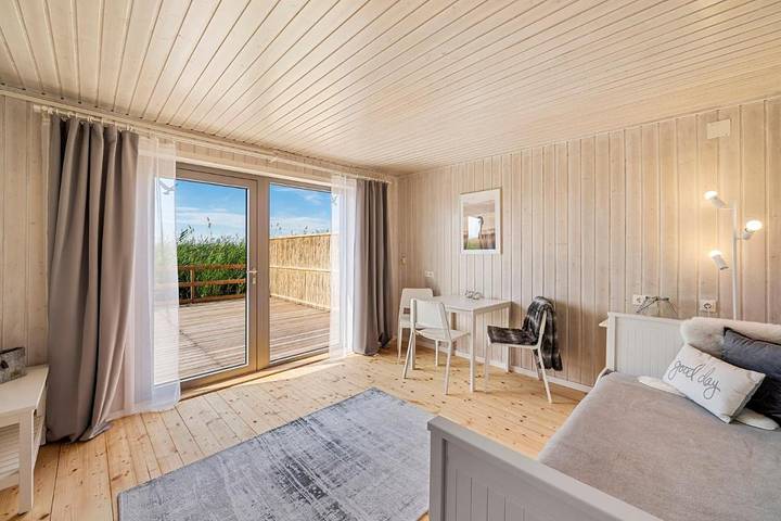Ferienhaus für 4 Personen, mit Terrasse und Ausblick in Weiden am See