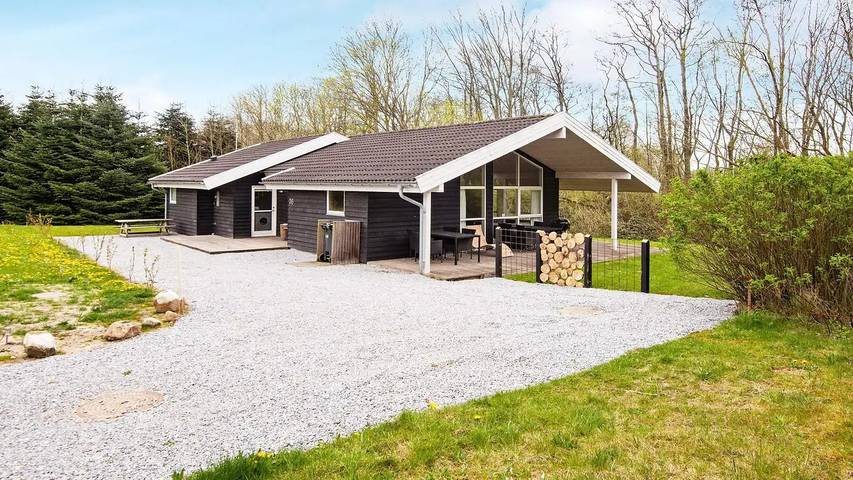 Ferienhaus für 9 Personen, mit Whirlpool und Terrasse sowie Garten und Sauna in Mommark