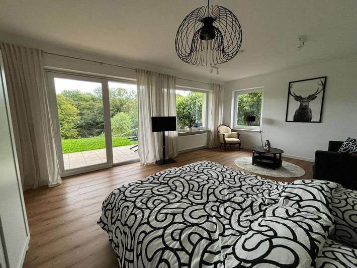 Ferienwohnung für 3 Personen, mit Terrasse und Garten sowie Ausblick - 1