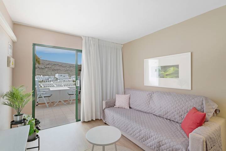 Apartamento entero, Apartamento de vacaciones 'Dreams' con vistas al mar, piscina compartida y Wi-Fi in Puerto Rico (Gran Canaria), Mogán