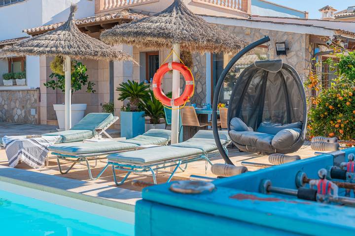 Casa de vacaciones 'La Playita' con vistas al mar, piscina, jardín y Wi-Fi in Badia Gran, Lluchmayor