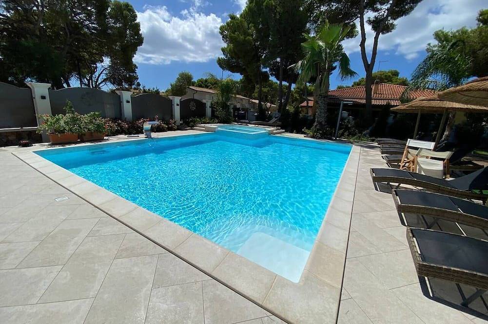 Entire apartment, Aquamarina Pavoncella Blue & Spa in Porto Pino Beach, Porto Pino