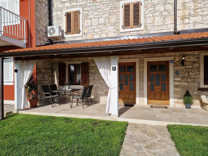 Ferienwohnung für 3 Personen, mit Terrasse und Ausblick in Katoro