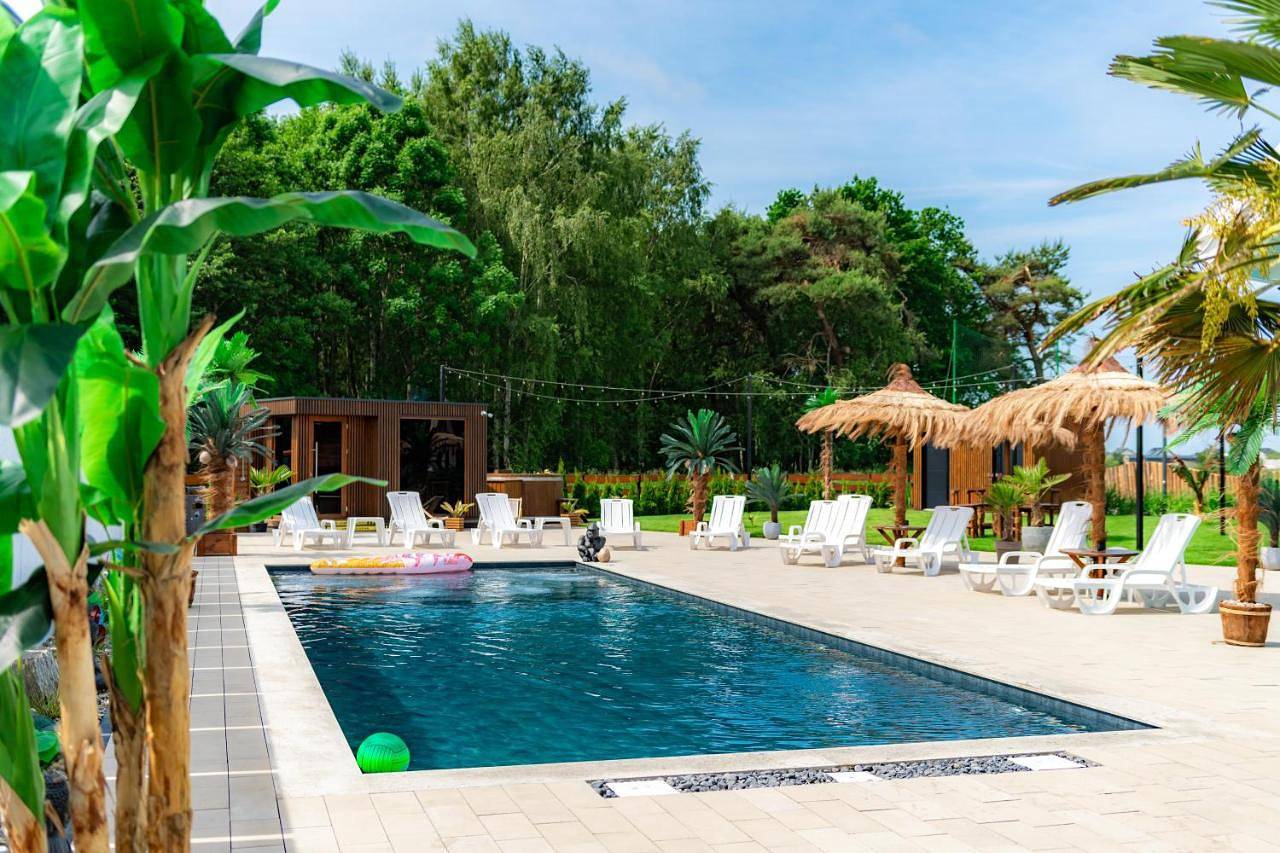 Domki Piaskowa11 Palm Resort & Wellness - Basen, Jacuzzi, Balia, Sauna, Egzotyczne Papugi Ara in Nowęcin, Baltic Sea Pomerania