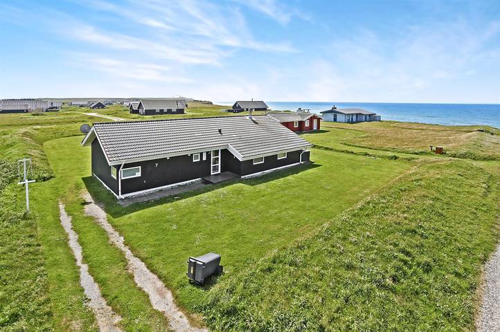 Feriehus for 8 personer, med jacuzzi og sauna i tillegg til terrasse i Nordjylland