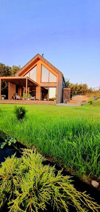 Stodoła Rzym - domek, jacuzzi, sauna, jezioro, las in Chmielno