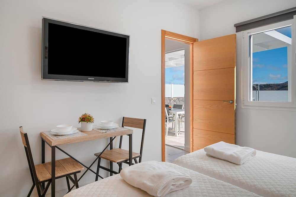 Casa de vacaciones 'Tranquilidad Entre Volcanes' con piscina privada, terraza compartida y Wi-Fi in Uga, Yaiza