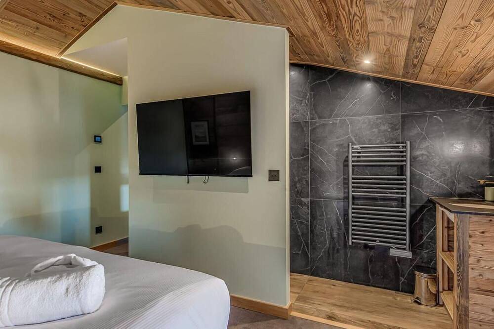 Landhaus, wifi, bis 10m skipiste, Erdgeschoss, sauna, terrasse, balkon, kamin oder ofen für holz in Plagne Villages, La Plagne-Tarentaise