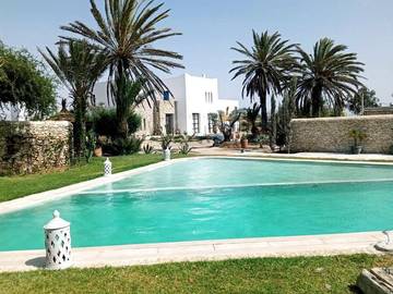 Maison d’hôte pour 2 personnes, avec jardin ainsi que piscine et vue dans Ghazoua