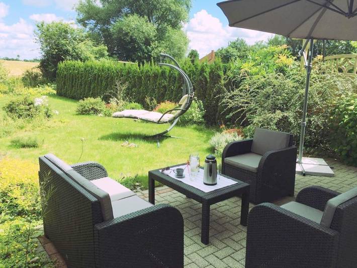 Ferienwohnung für 4 Personen, mit Terrasse und Garten sowie Ausblick