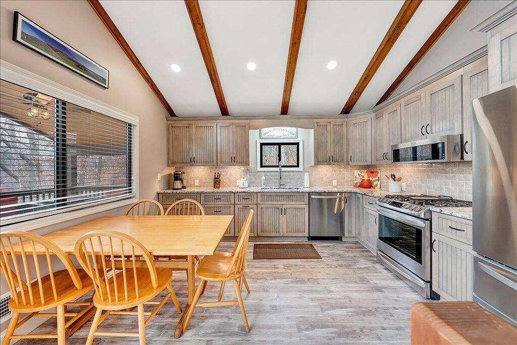 Beautiful Home On Gently Sloping Point Lot With 500 Feet Of Private Waterfront in Smith Mountain Lake