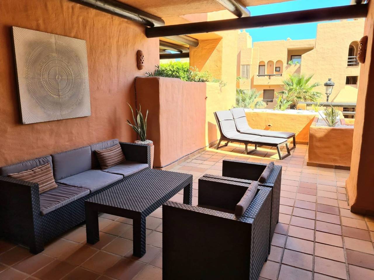 Entire apartment, 'Superb 2-bed Apartment in Duquesa' with Shared Pool, Terrace & Wi-Fi in Manilva, Costa del Sol