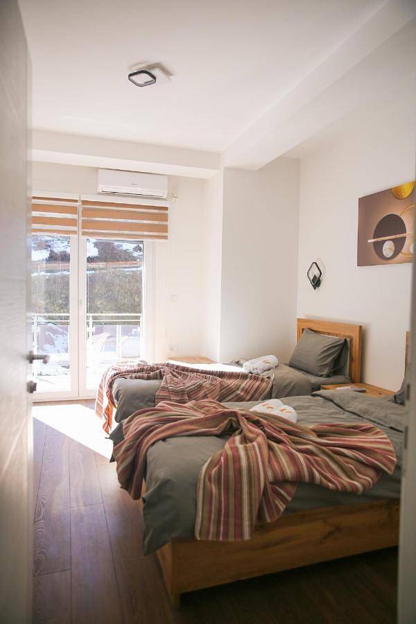 Appartement de vacances pour 2 personnes, avec vue ainsi que terrasse et jardin