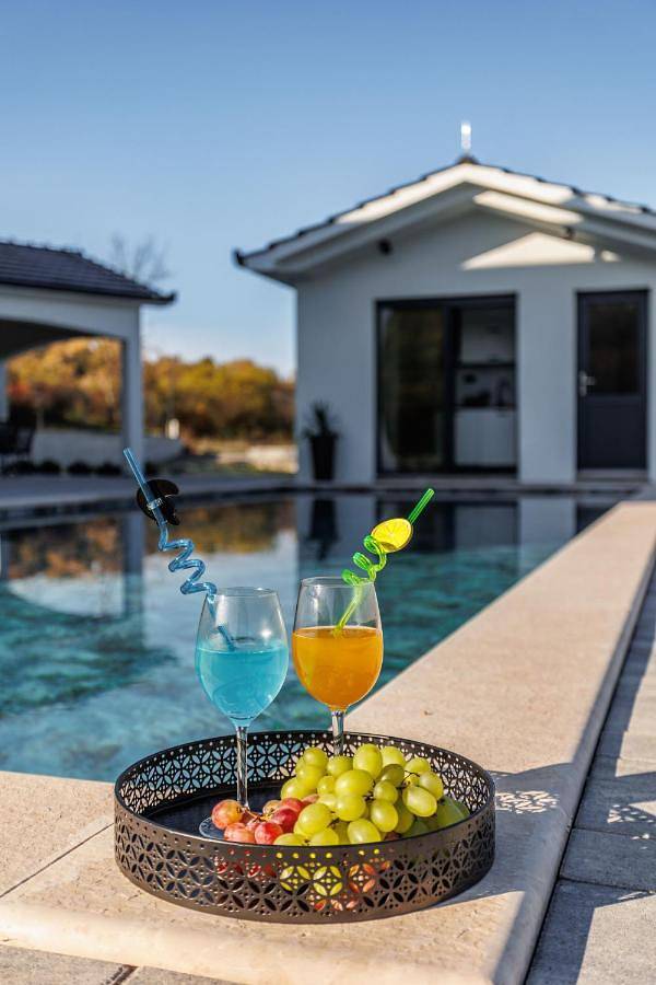 Ferienhaus für 8 Personen, mit Balkon und Terrasse sowie Garten und Pool