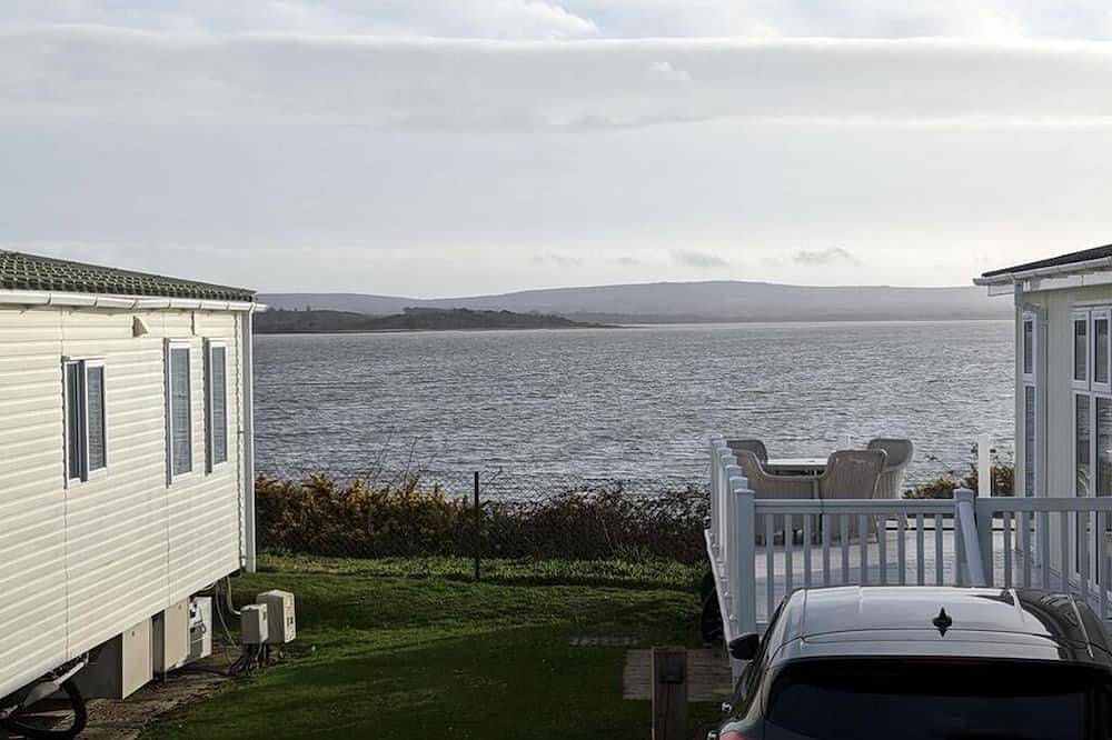 Safari Sunset caravan + sea view at Rockley Park, Poole Harbour. Dogs stay free! in Poole, Poole Harbour