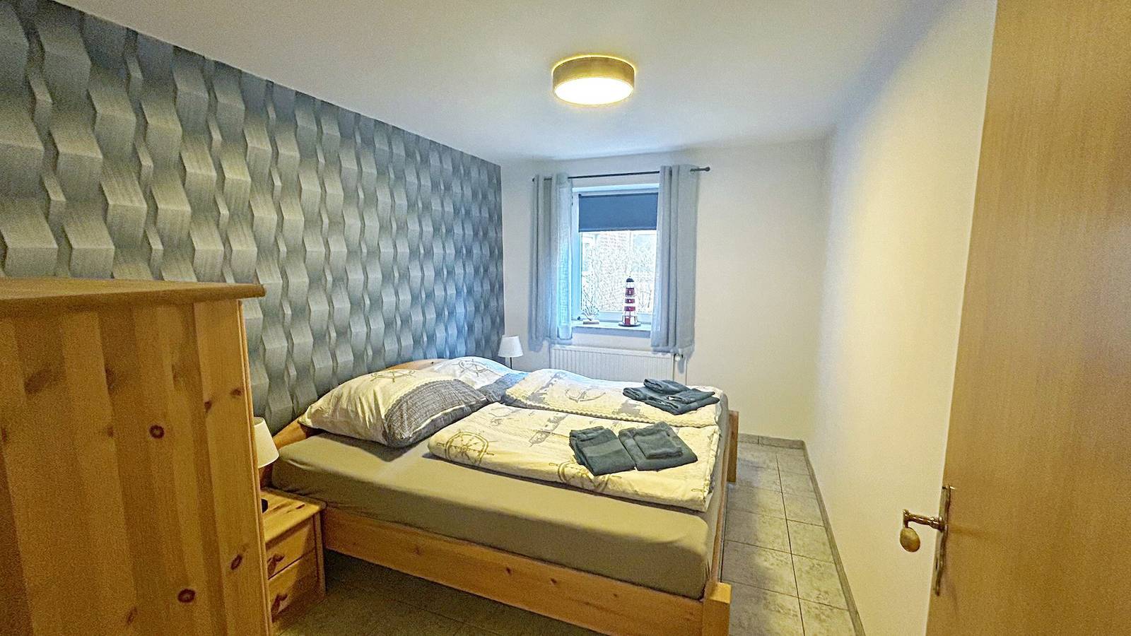 Geheel appartement, Appartement 'Ferienwohnung Uthlande' met gedeeld terras, gedeelde tuin en Wi-Fi in Langeneß, Halligen