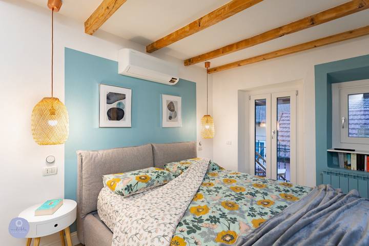 Apartamento inteiro, Apartamento 'Nido Blu - Cosy Home' com vista para o lago, Wi-Fi e ar condicionado in Belgirate, Município de Belgirate