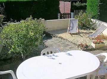 Cottage pour 4 personnes, avec terrasse dans La Palmyre