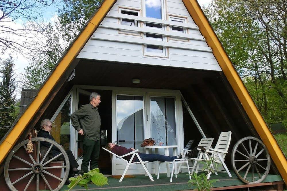 Nurdachhaus im Pfälzer Wald für bis zu 6 Personen mit Terrasse, Garten und Wlan in Gossersweiler-Stein, Trifelsland