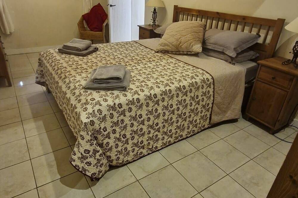 Secluded villa with large garden pool\noverlooks beautiful picturesque\nvillage in Soubès, Lodève region