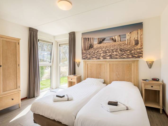 Ferienhaus für 6 Personen, mit Terrasse und Garten sowie Pool, kinderfreundlich in De Koog - 4